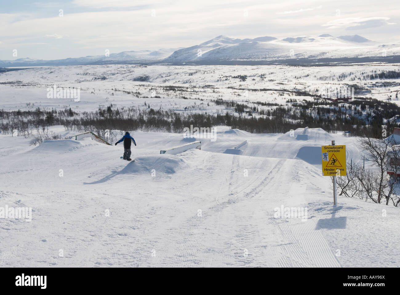 Boy on snowboard. Stock Photo