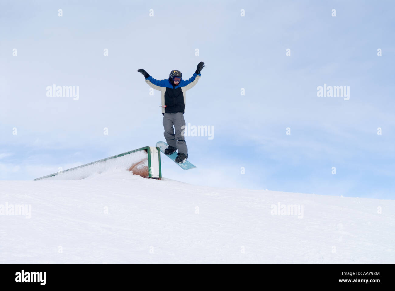 Boy on snowboard. Stock Photo