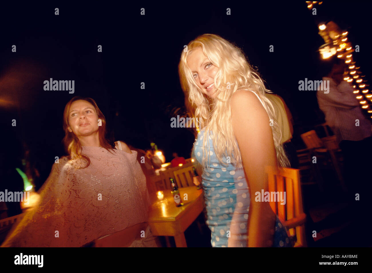 Girls dancing in a on the beach in Cabarete Dominican Stock