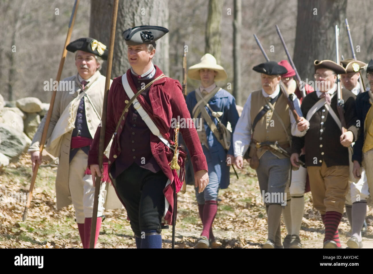 colonists marching to battle during Battle Road reenactment Stock Photo