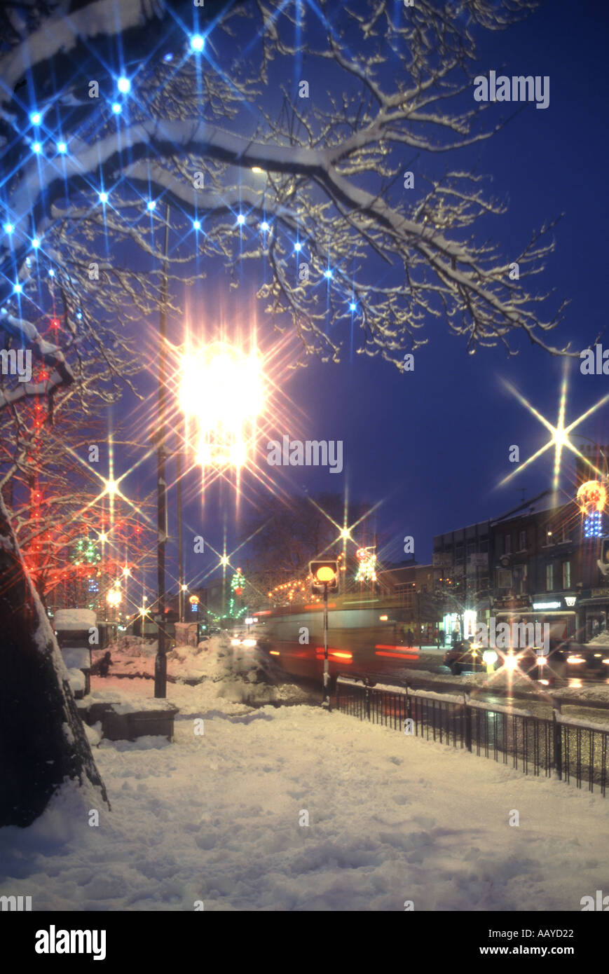 Brentwood high street Christmas decoration at dusk after snow storm