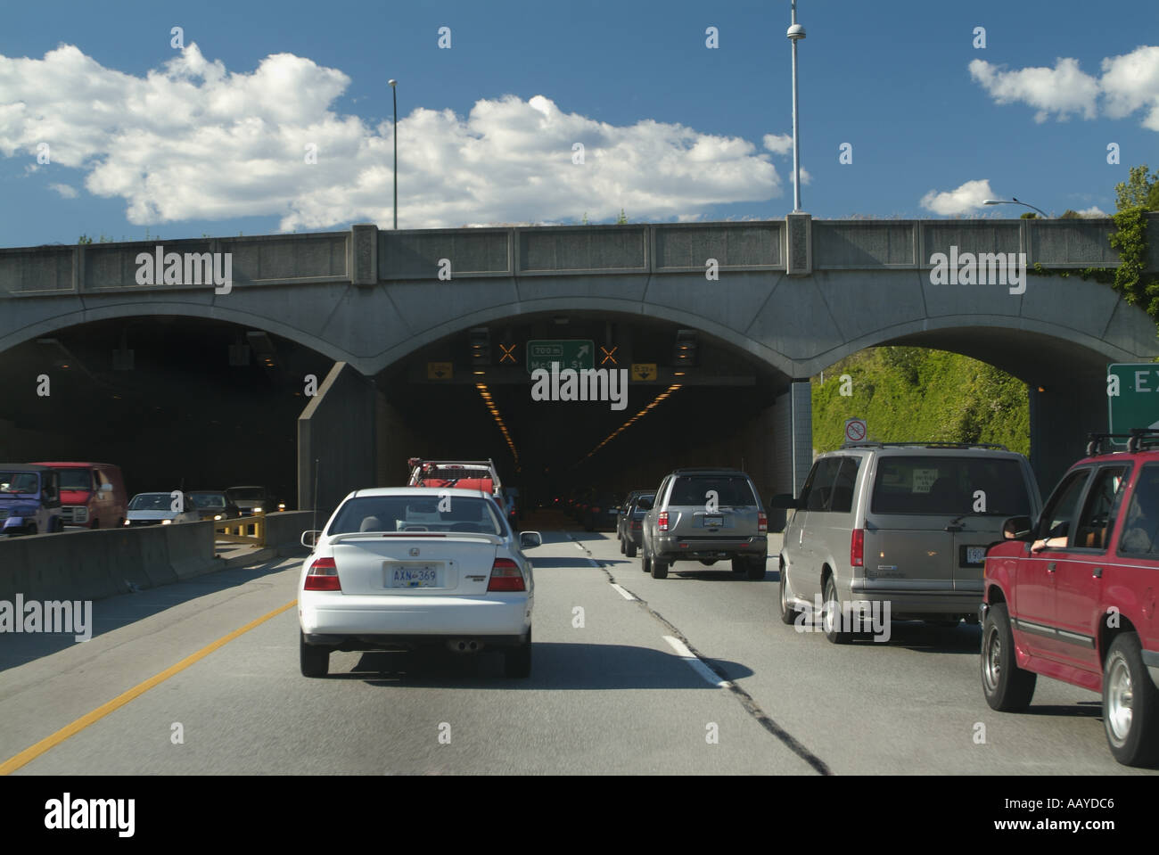 Rush hour traffic on Trans Canada Highway 1 entering tunnel Vancouver British Columbia Canada Stock Photo