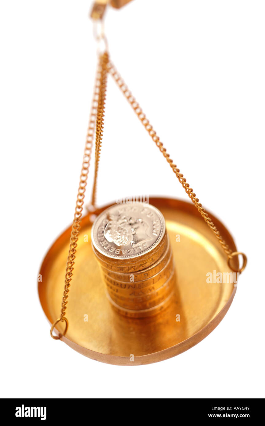 Weighing scale coins hi-res stock photography and images - Alamy