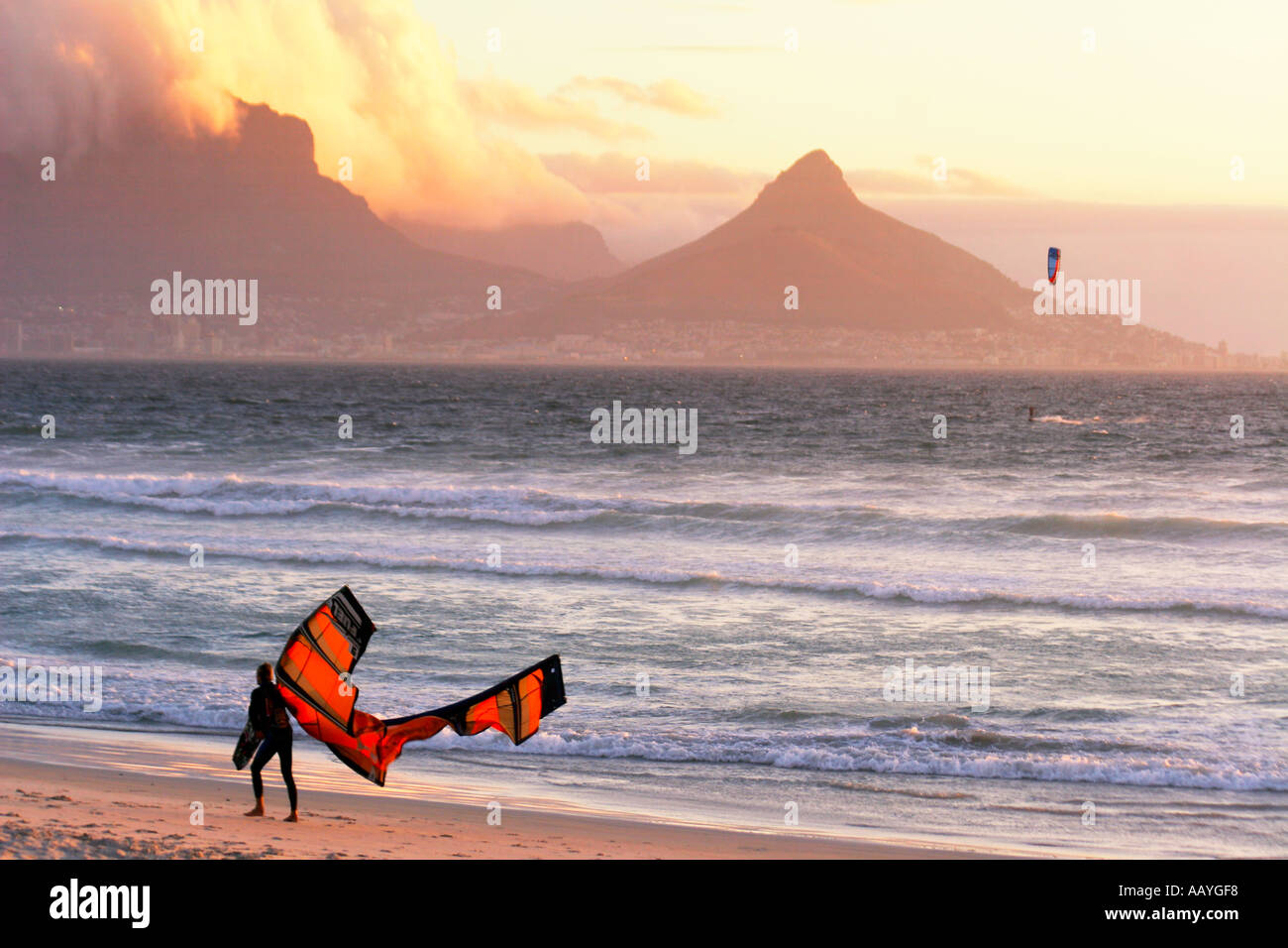 south africa cape town blouberg beach table mountain sunset kitesurfer Stock Photo