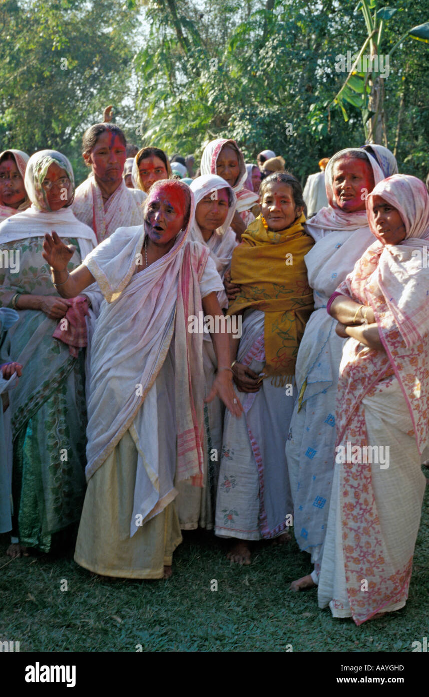 Group of women celebrate Holi Festival at the Bengenati Sattra on the river island of Majuli, Assam Stock Photo