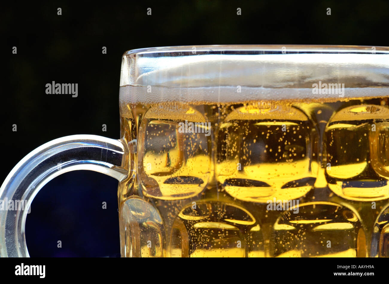 Beer in a glass and smoked fish. Nearby is a measuring tape. On pine boards.  A day without diets Stock Photo - Alamy