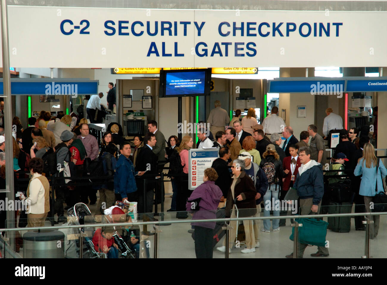 People waiting in line at airport security checkpoint, Newark International Airport, North America Stock Photo
