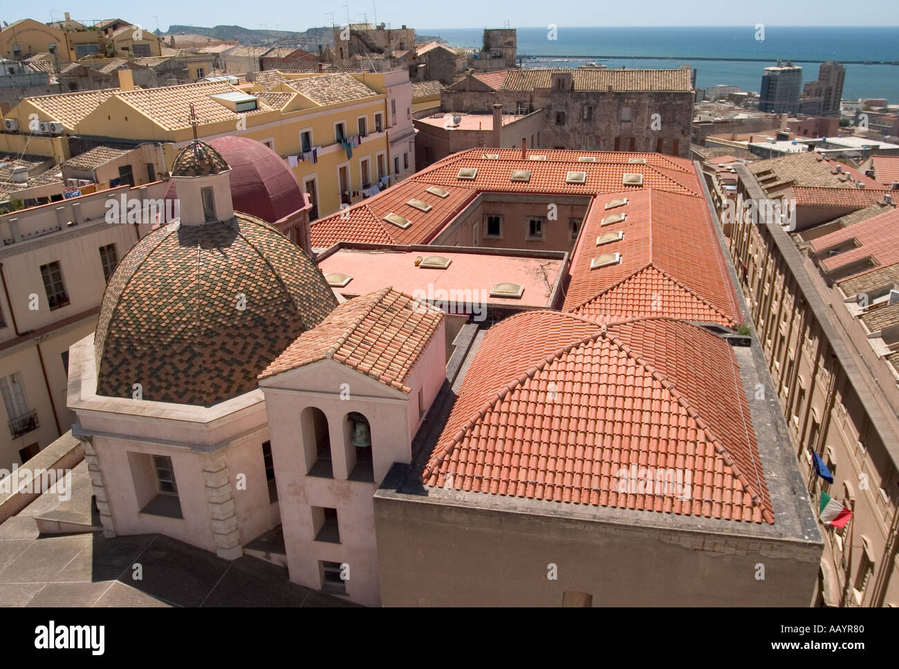 Tiled roofs and port. Cagliari, Sardinia Stock Photo