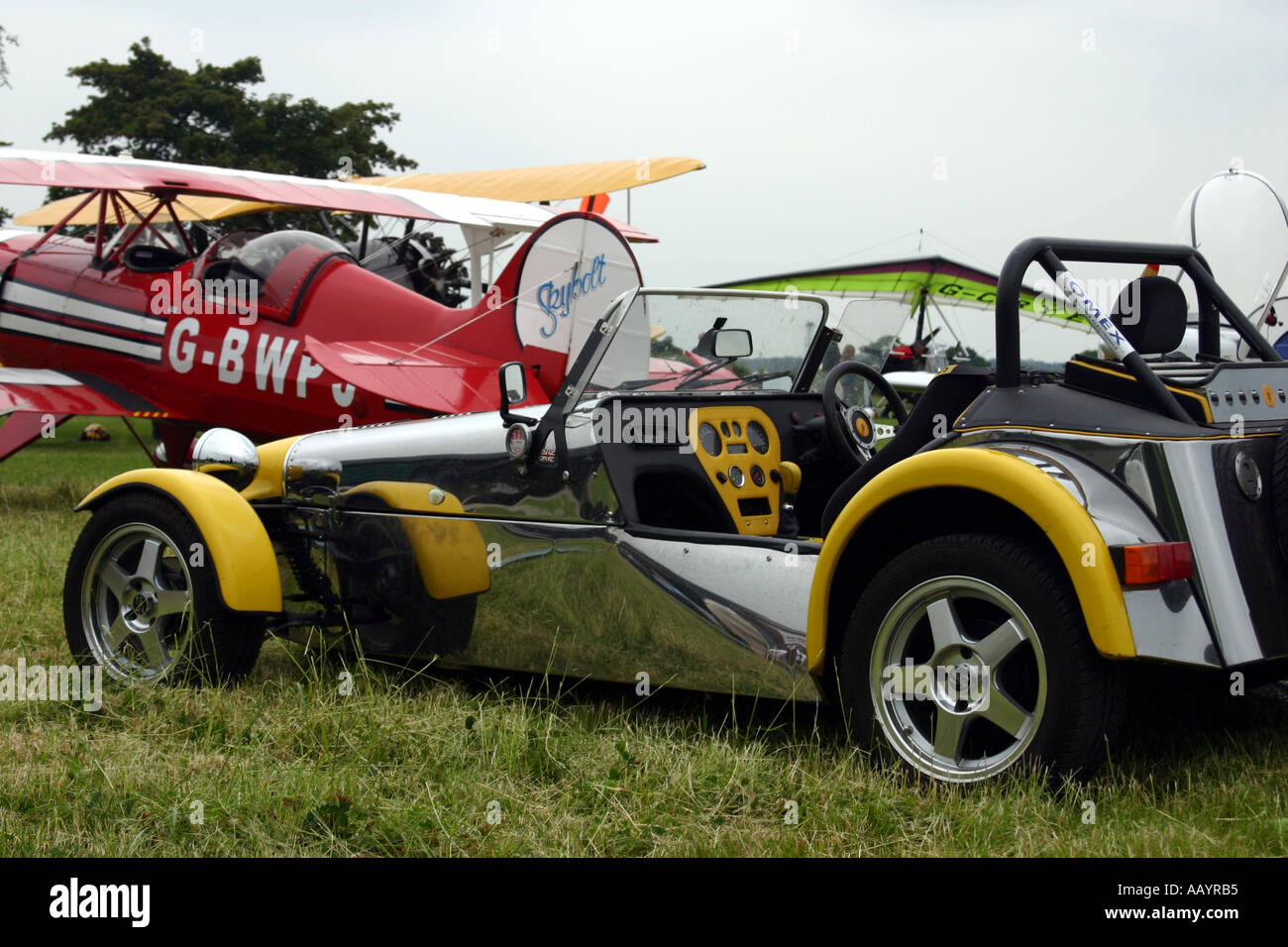 homebuilt Steen Skybolt biplane and kit car on an airfield in  Worcestershire June 2005 Stock Photo - Alamy