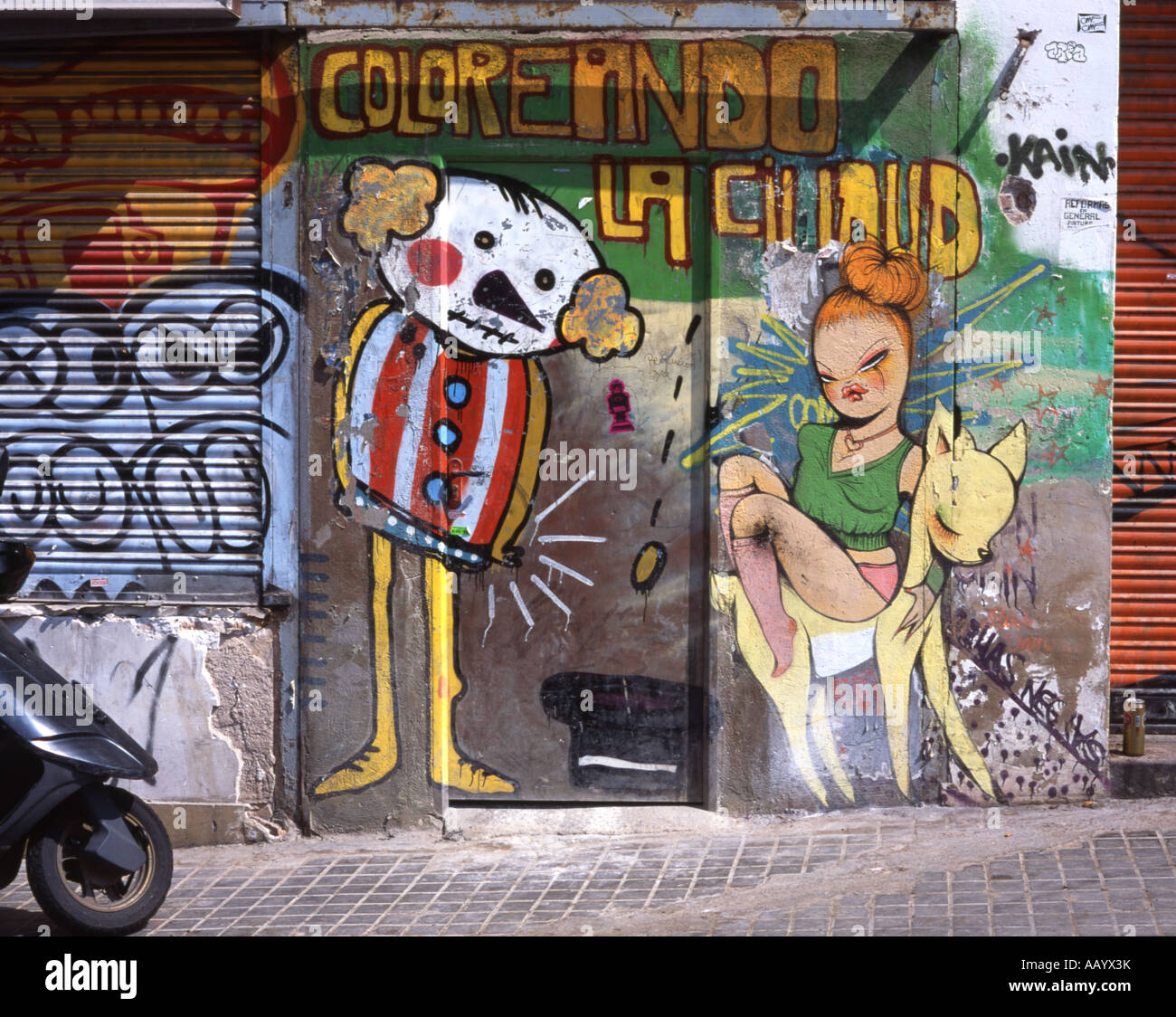 Barcelona, Catalunya, Spain. Graffiti and motor scooter Stock Photo