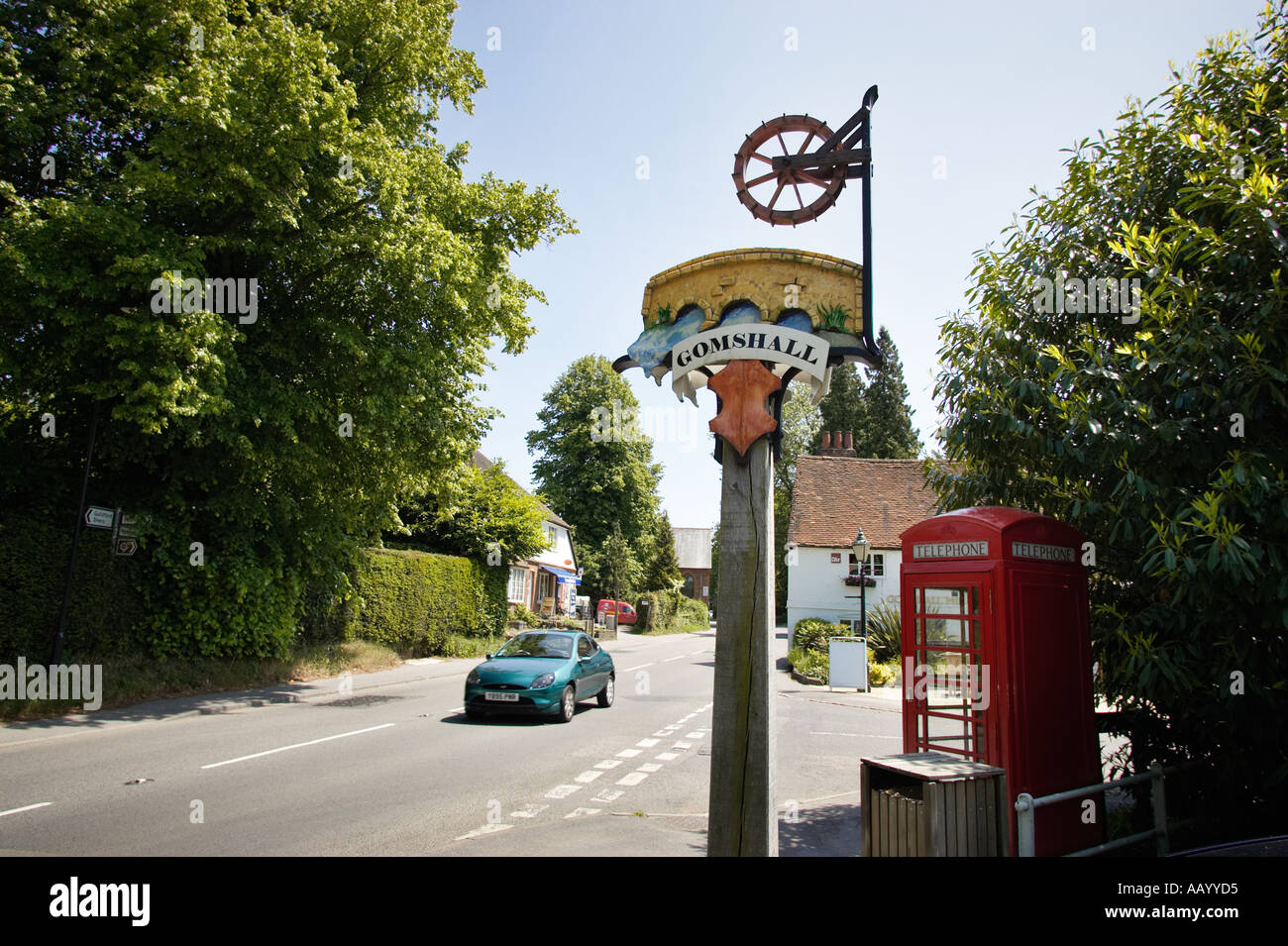 Gomshall Village sign and road, Surrey, England, UK Stock Photo