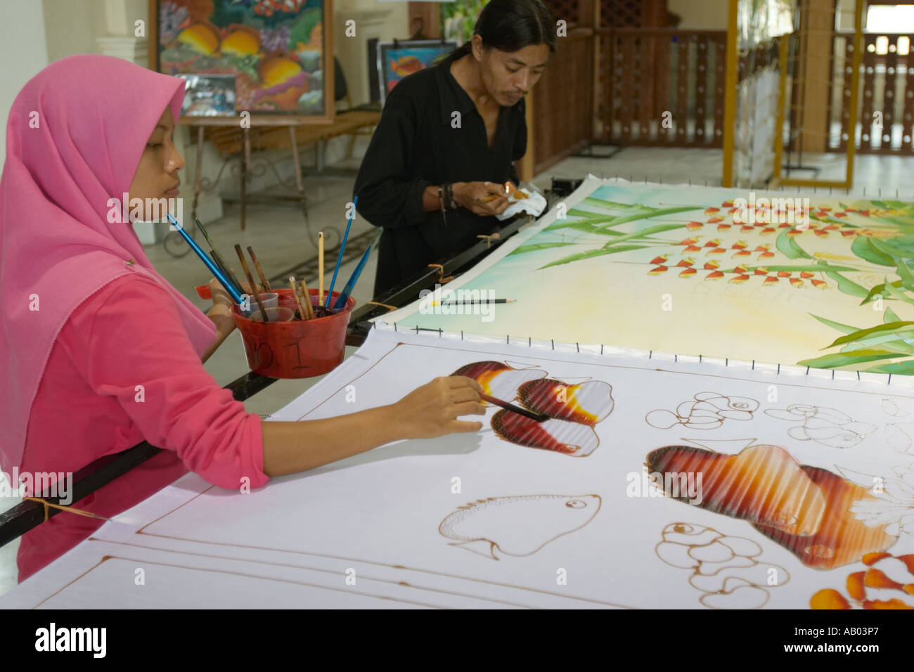 Local artists paint batik at Langkawi Handicraft Cultural Complex