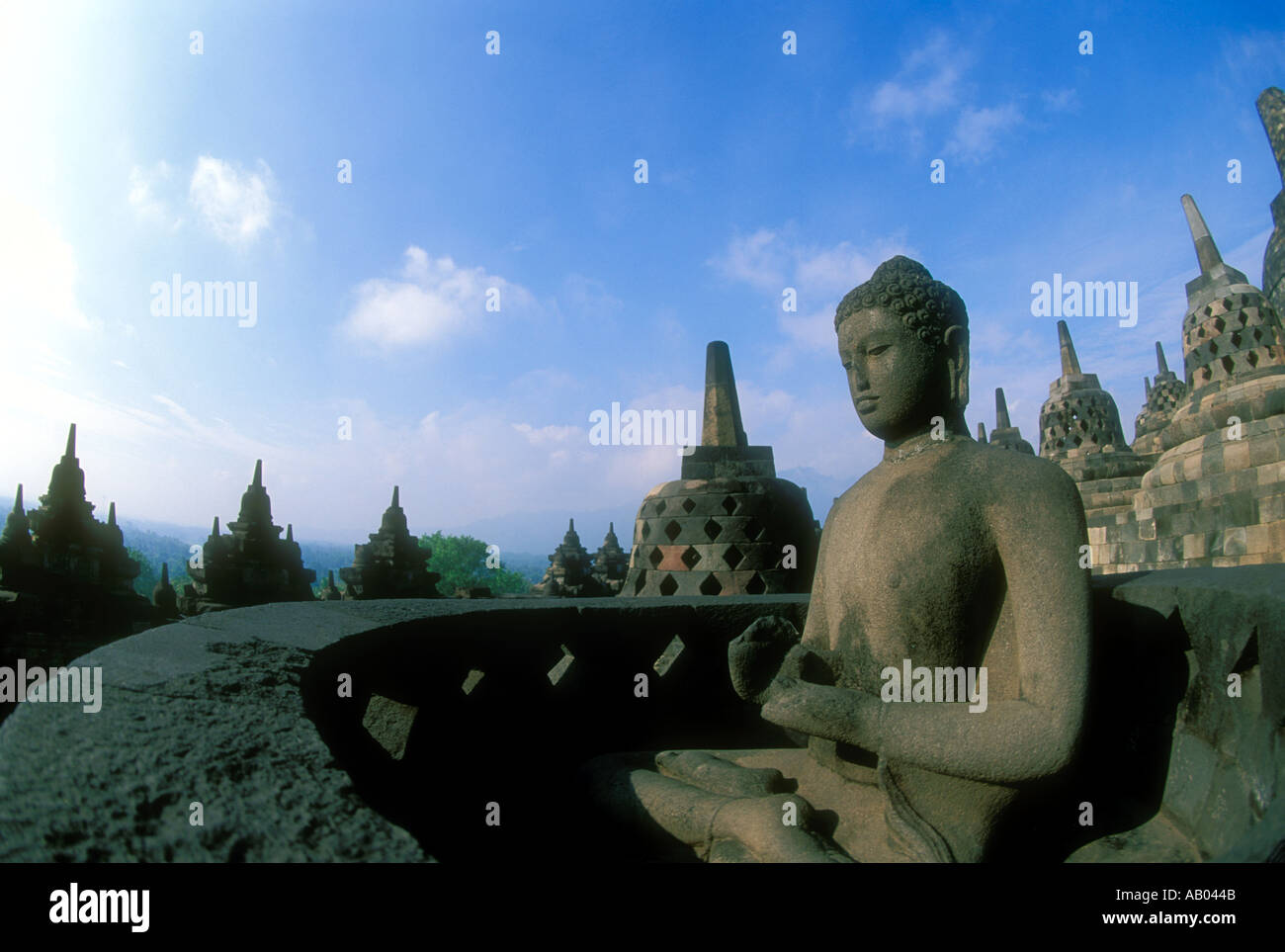 Stone Buddha at the Borobudur Buddhist complex on the island of Java in ...