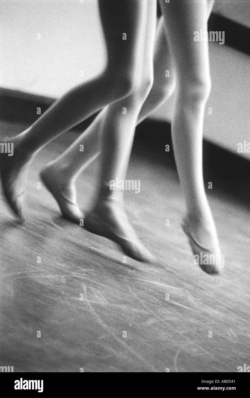 Dancers legs with ballet slippers Stock Photo