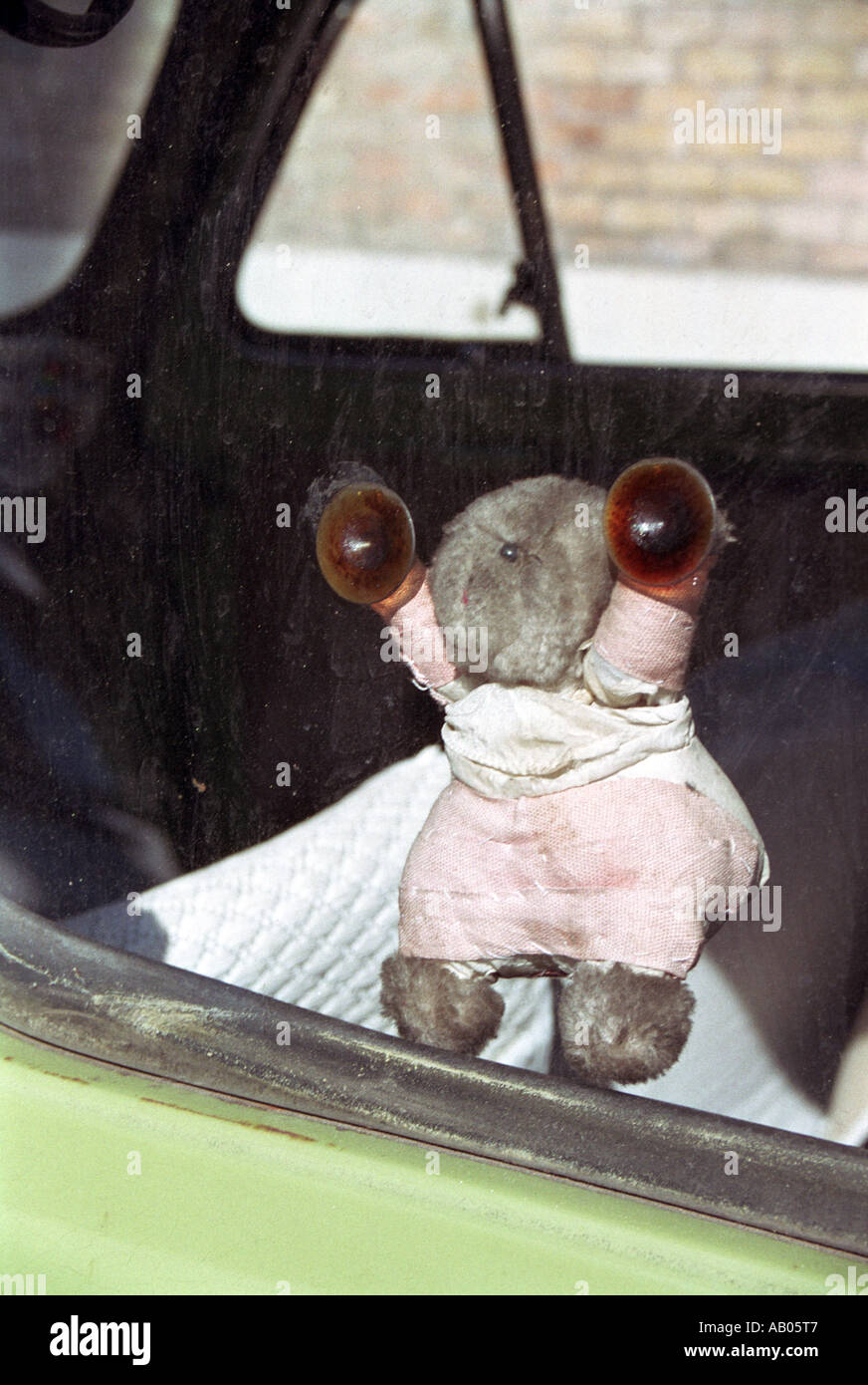 toy stuck to car window Stock Photo Alamy