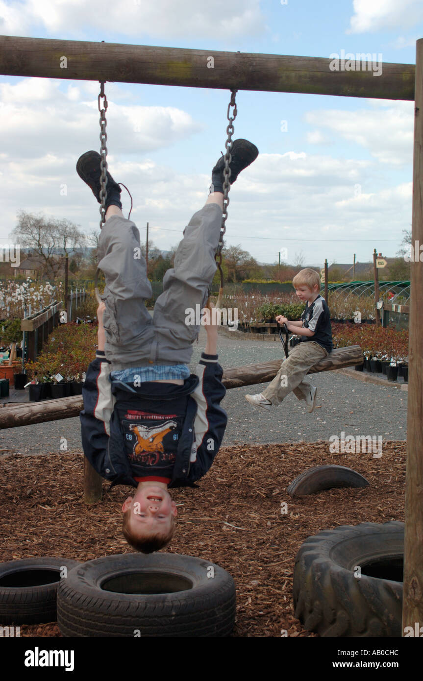 Boy Hanging Upside Down Stock Photo Alamy