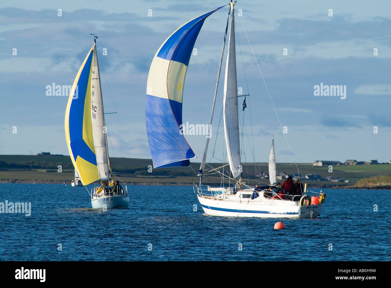 dh Sailing yacht club KIRKWALL BAY ORKNEY Sail yachts racing yachtsmen race yachting sport action cruising scotland boats sea Stock Photo