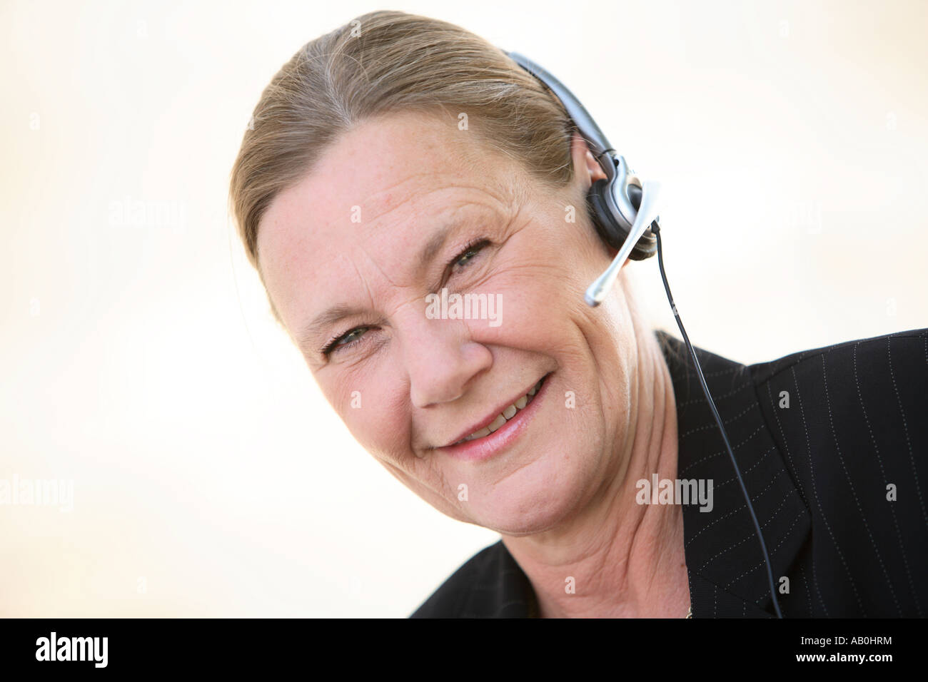 Businesswoman with headset Stock Photo