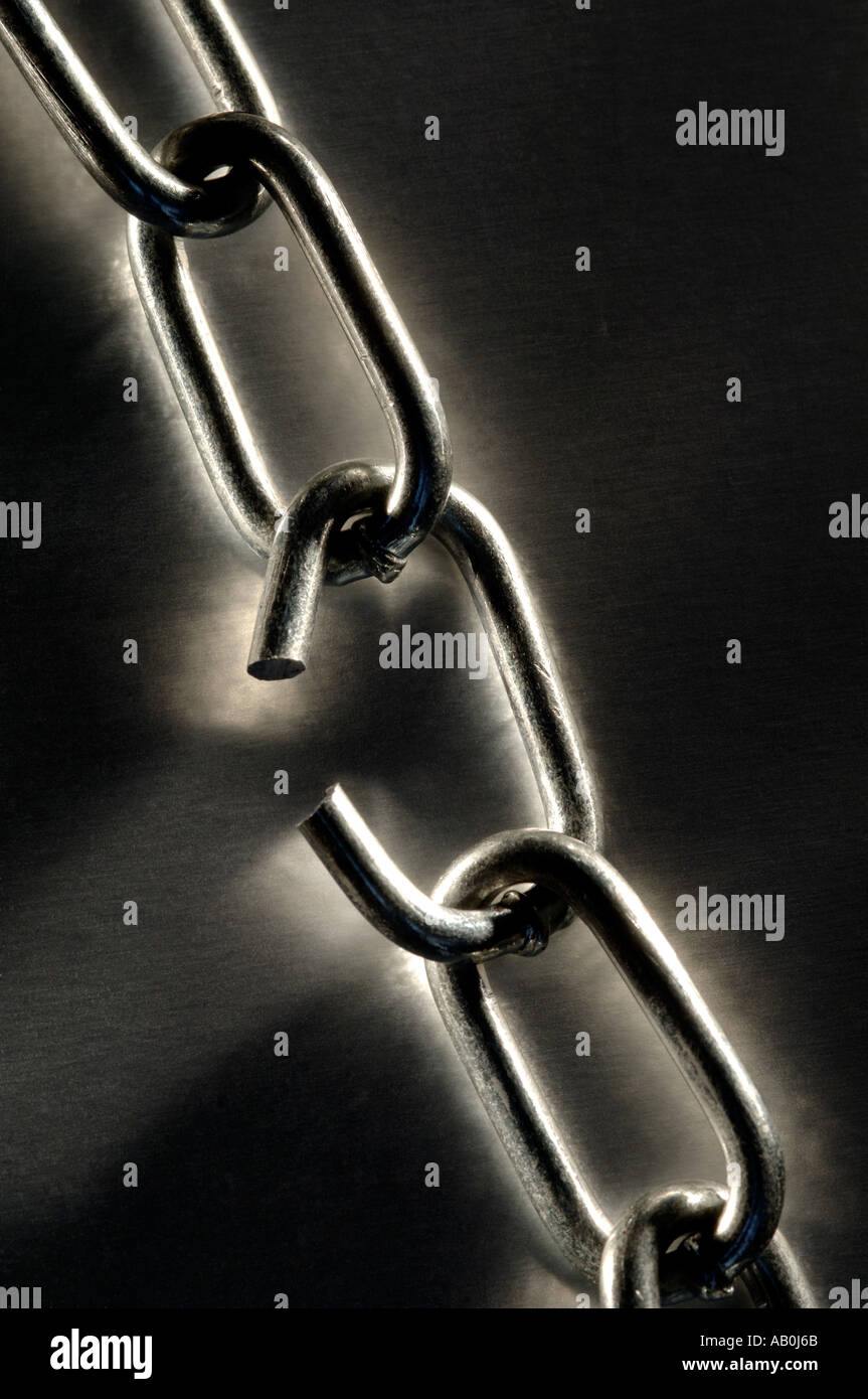 Broken link in a chain Stock Photo Alamy