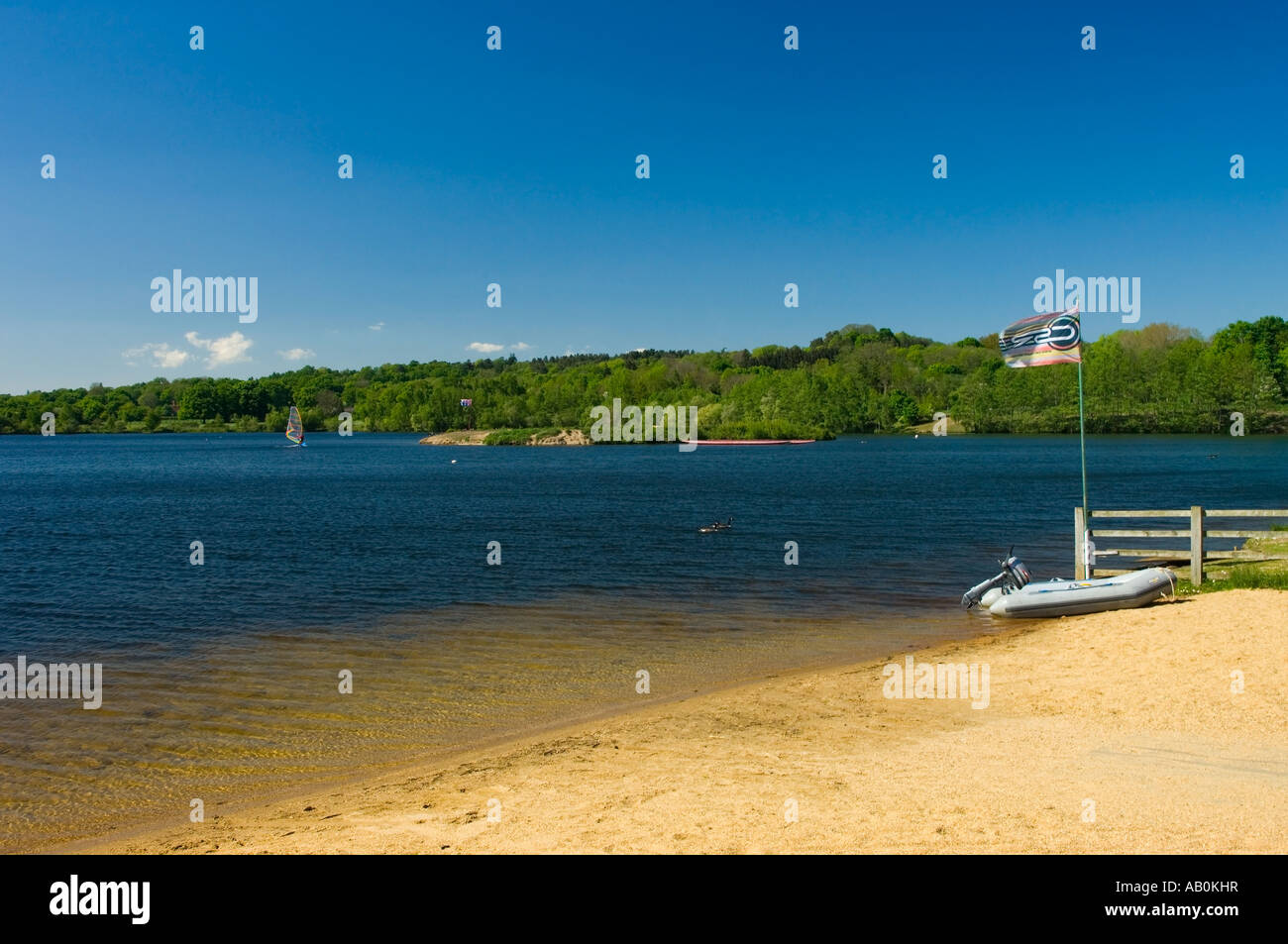 Motorboat on the beach of Horseshoe Lake at Trilakes Country Park Sandhurst Berkshire England Great Britain UK Stock Photo