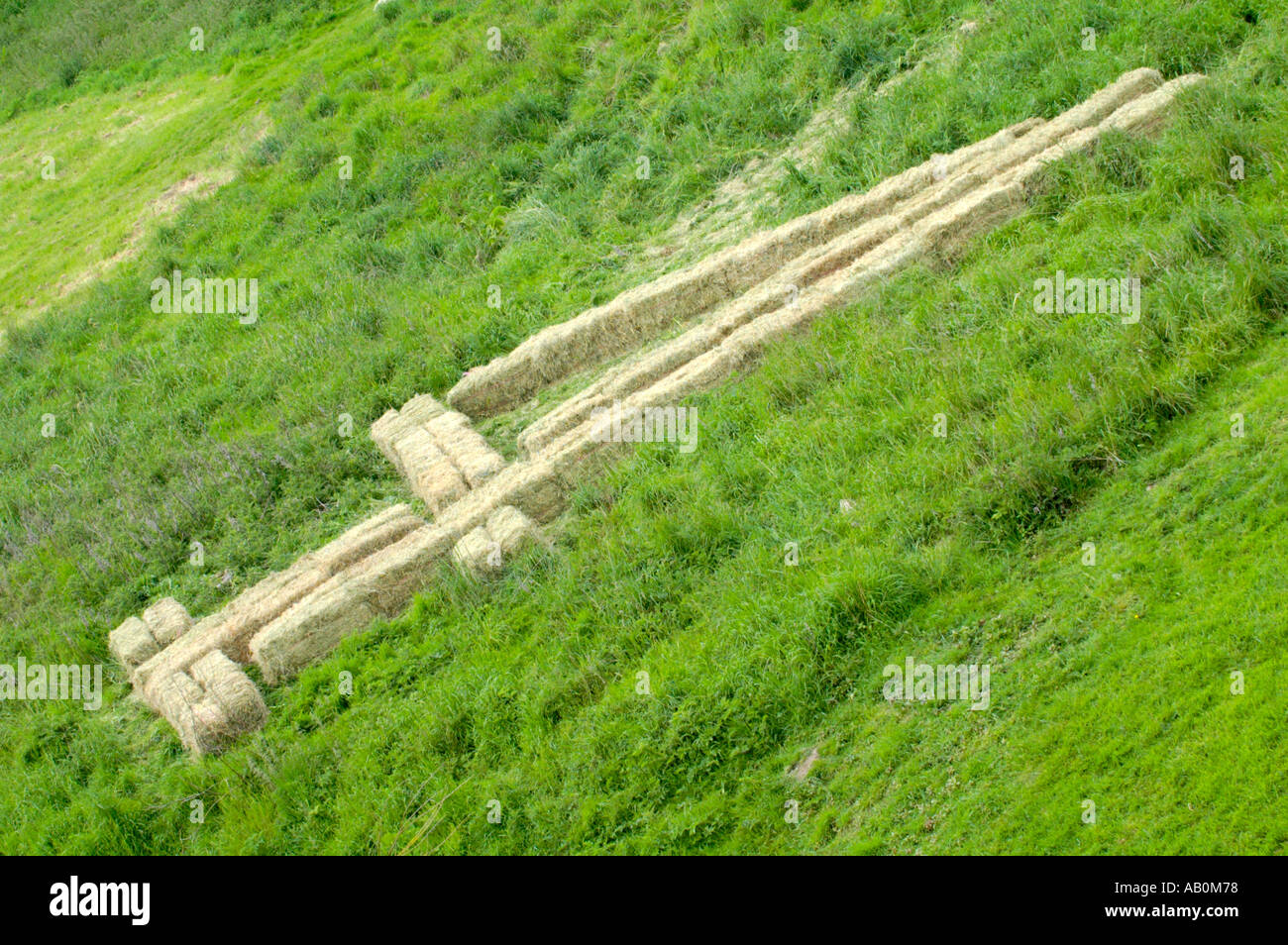 Channel 4 television logo made with bales of straw at Hay on Wye Powys Wales UK during the annual book festival Stock Photo