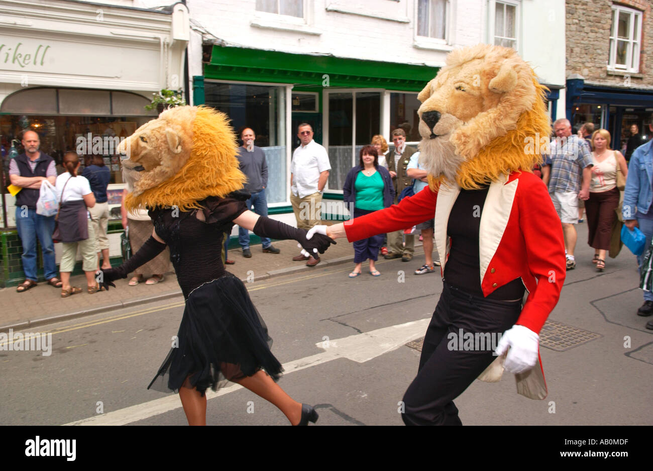 performers-with-lion-heads-from-giffords-circus-dance-in-the-street-at