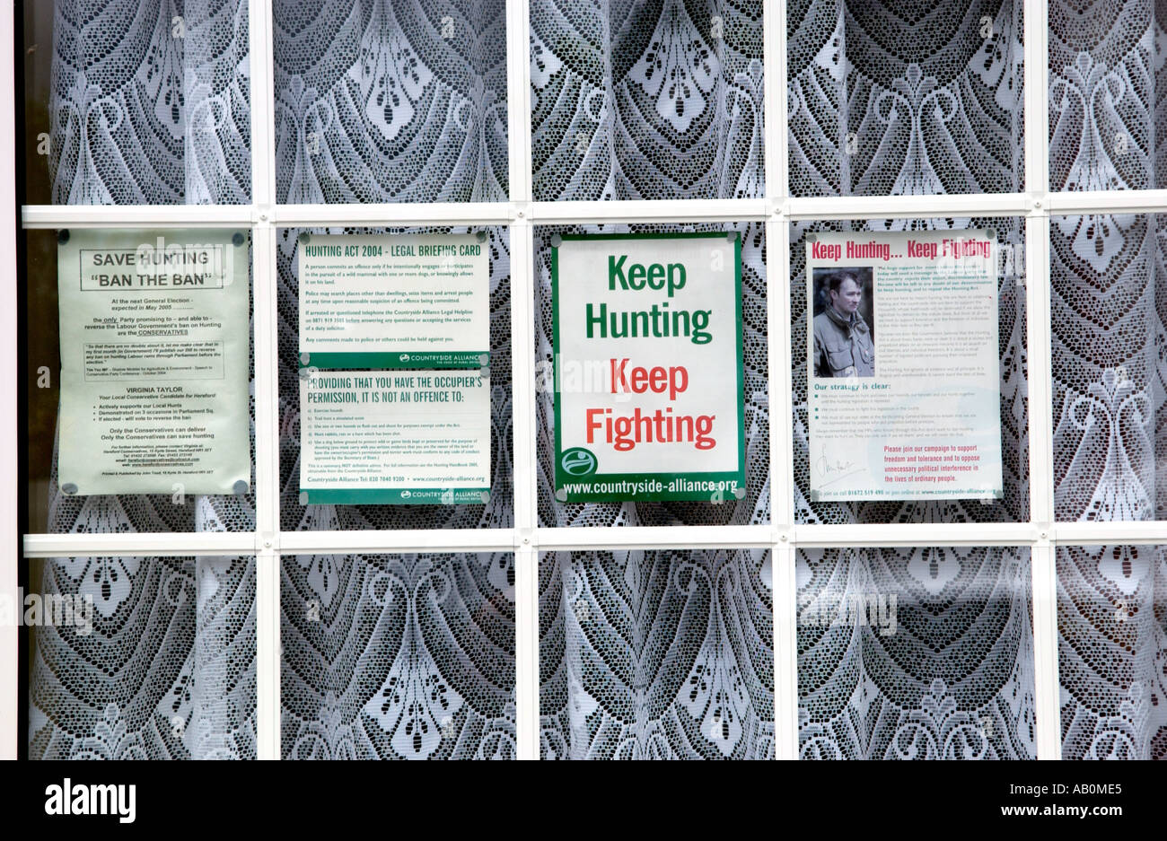 Posters in window hi-res stock photography and images - Alamy