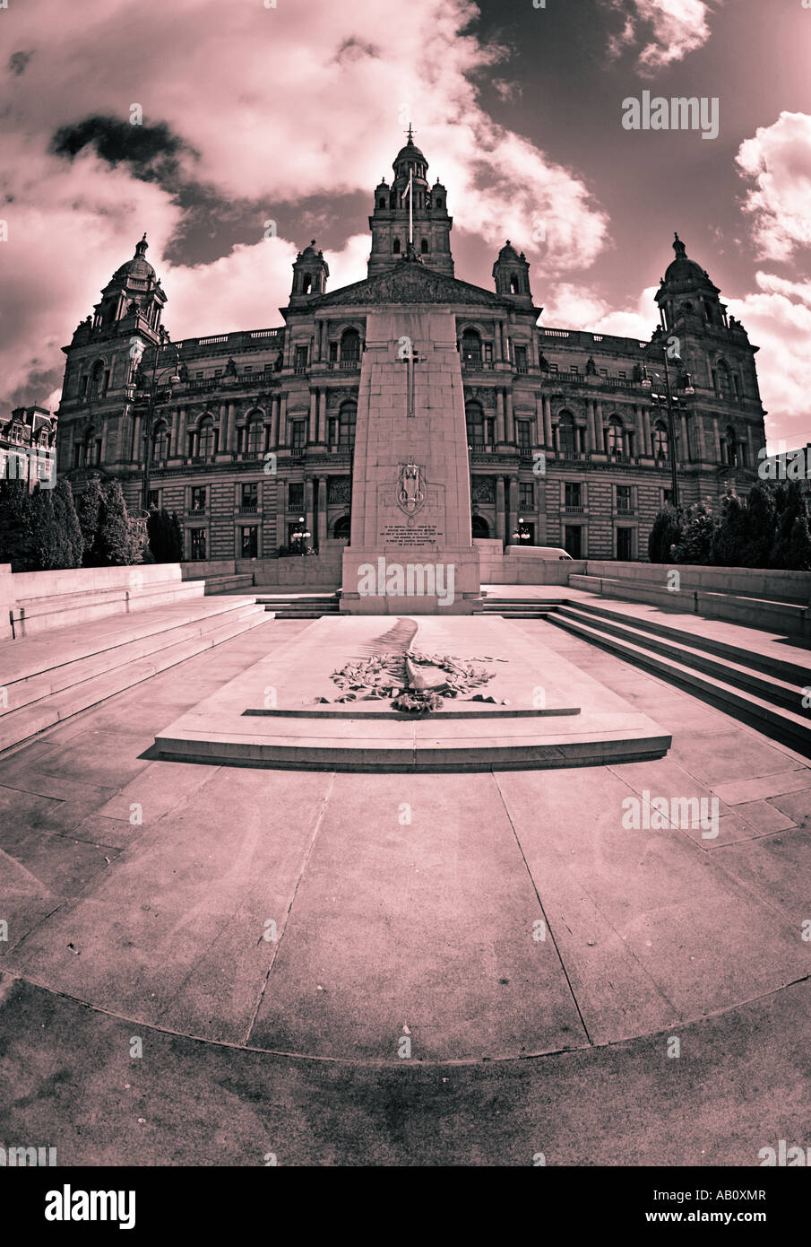Wide angle portrait image of Georges Square and the city chambers building in Glasgow Scotland in black and white sepia Stock Photo