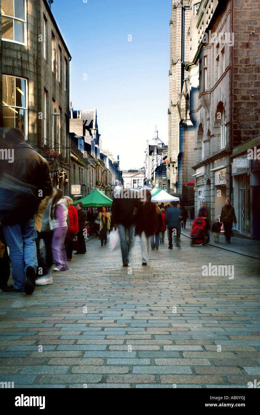 Belmont Street Aberdeen on market day with blurred moving people. Stock Photo