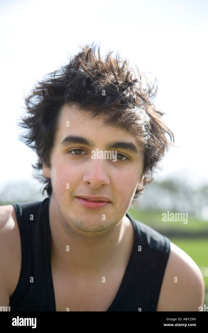 Outdoor Portrait Of 18 Year Old Teenage Boy Uk Stock Photo