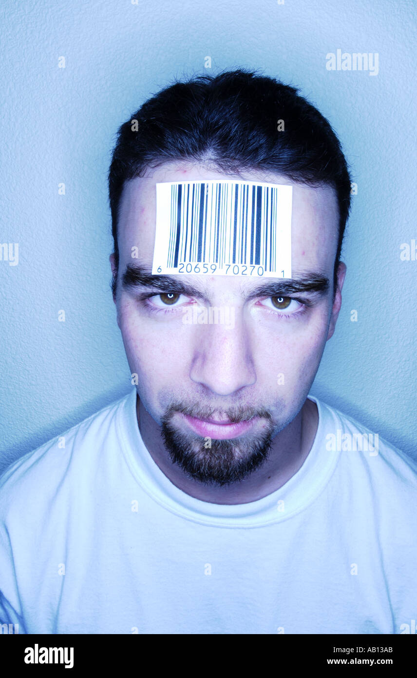 Man with barcode label on forehead Stock Photo