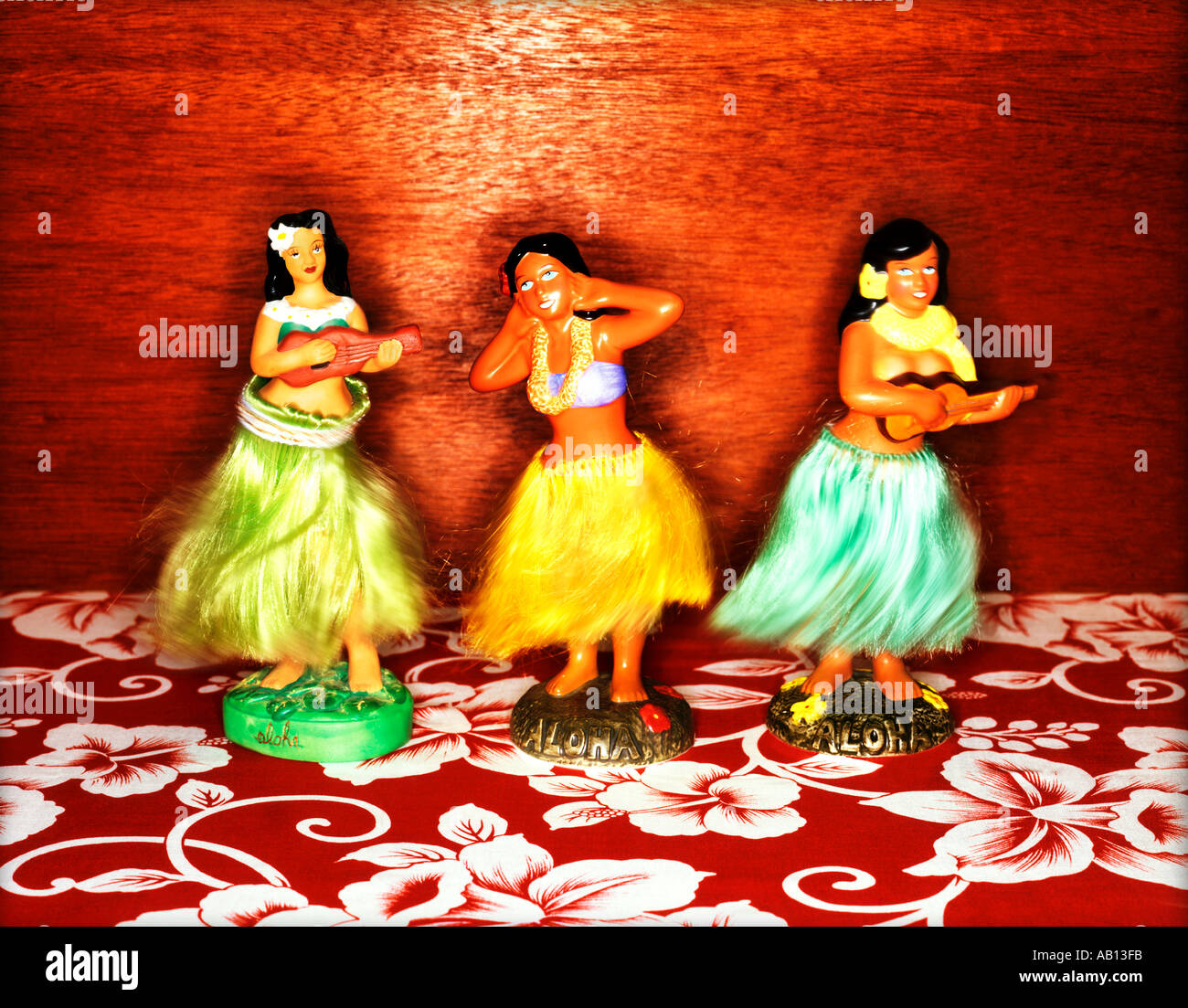 dashboard hula girls on flowered background Stock Photo - Alamy