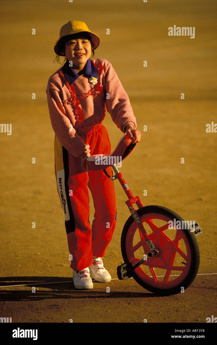 Young girl with her unicycle in Himeji Japan Stock Photo Alamy
