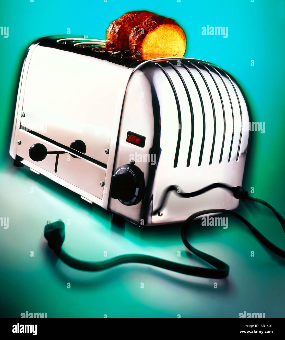 chrome toaster on blue green background Stock Photo Alamy
