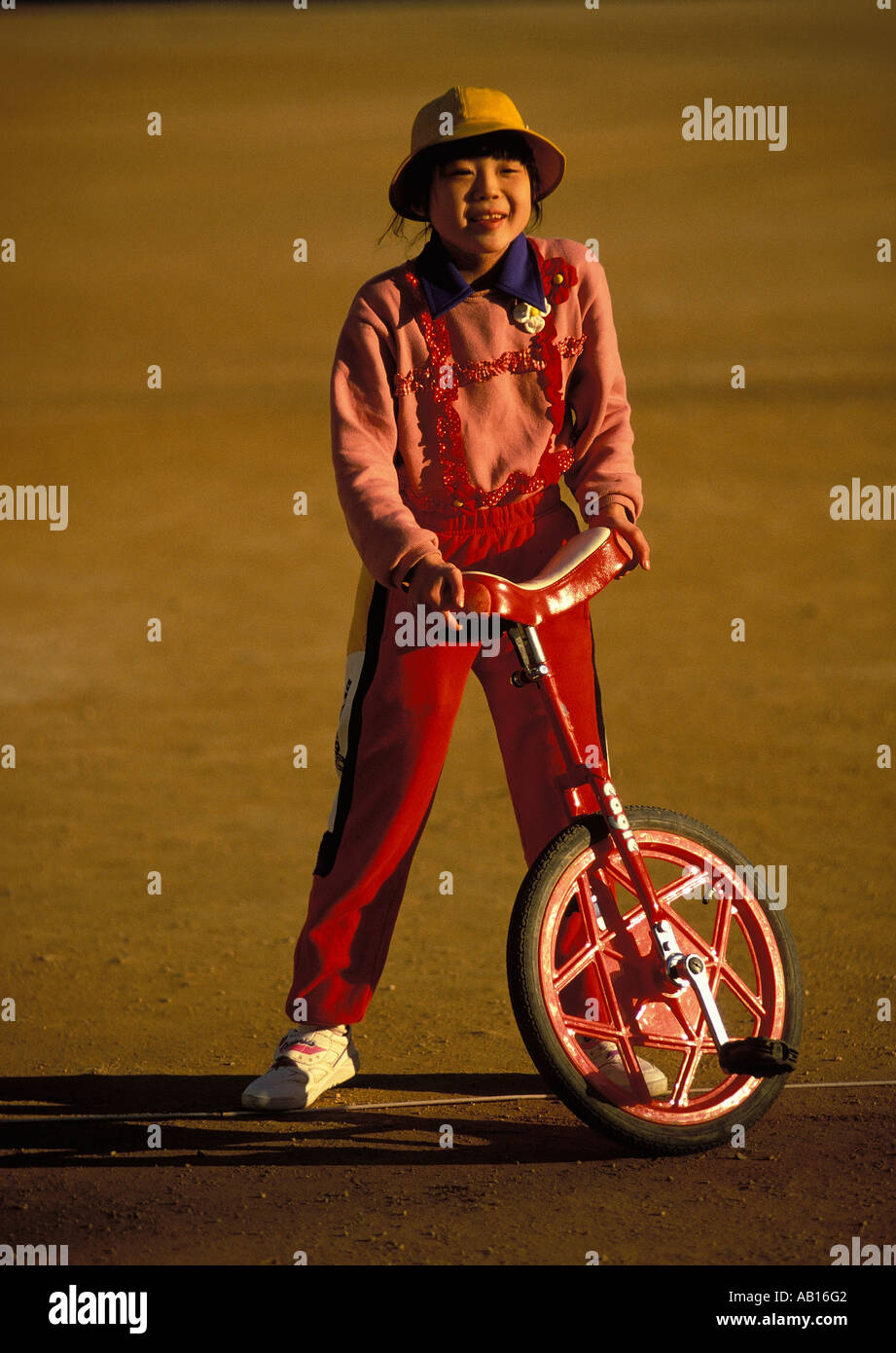 Young girl with her unicycle in Himeji Japan Stock Photo Alamy