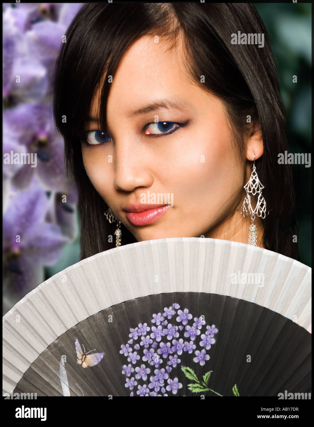Asian beauty with Chinese fan Stock Photo