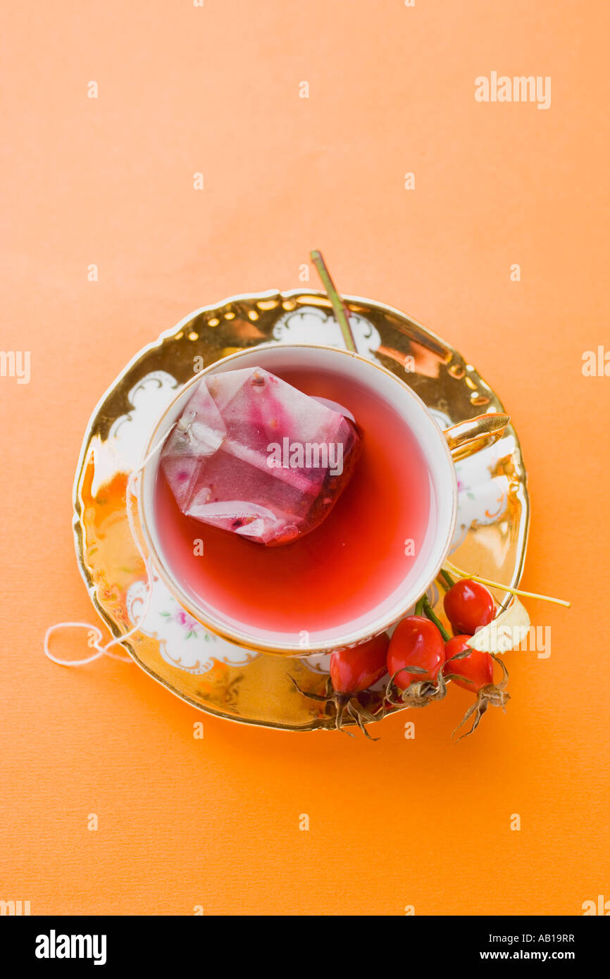 Rose hip tea with tea bag in china cup FoodCollection Stock Photo Alamy