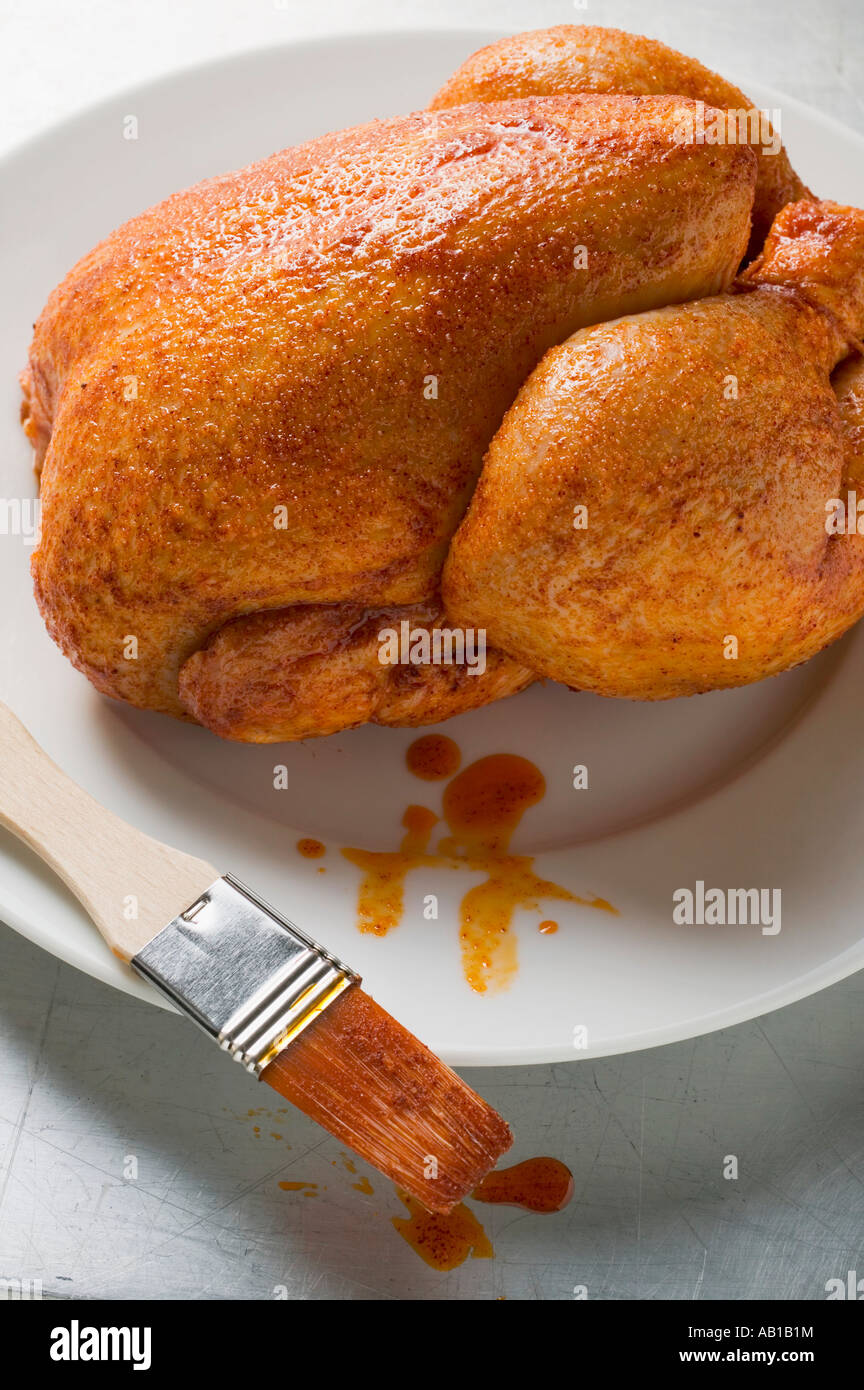 Chicken basting hires stock photography and images Alamy