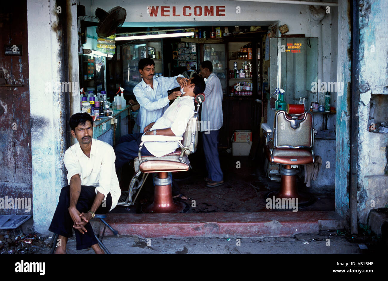 Barber's shop in Calangute market, Goa, India. Stock Photo