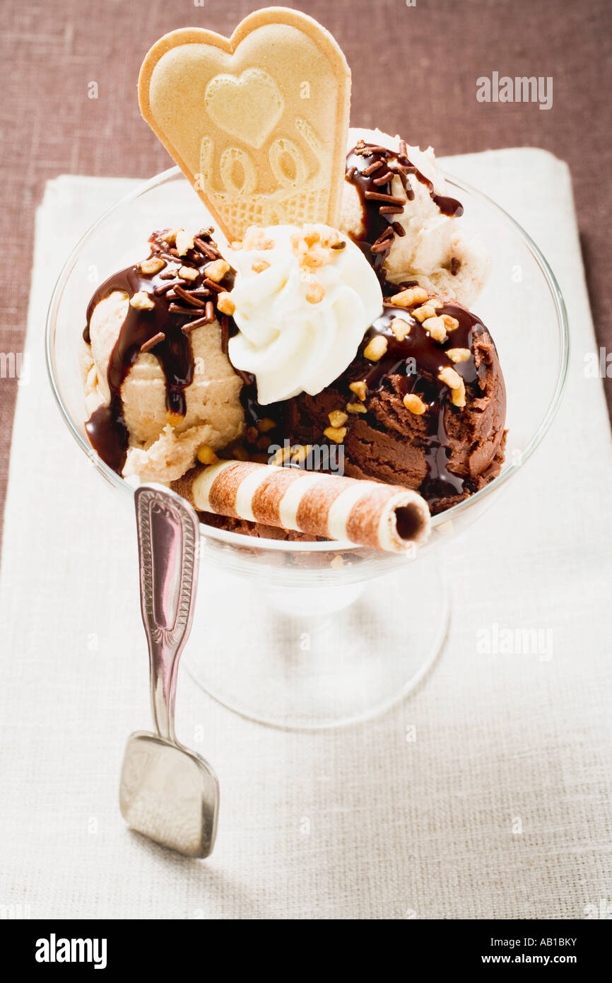 Chocolate nut sundae with cream and wafers FoodCollection Stock Photo