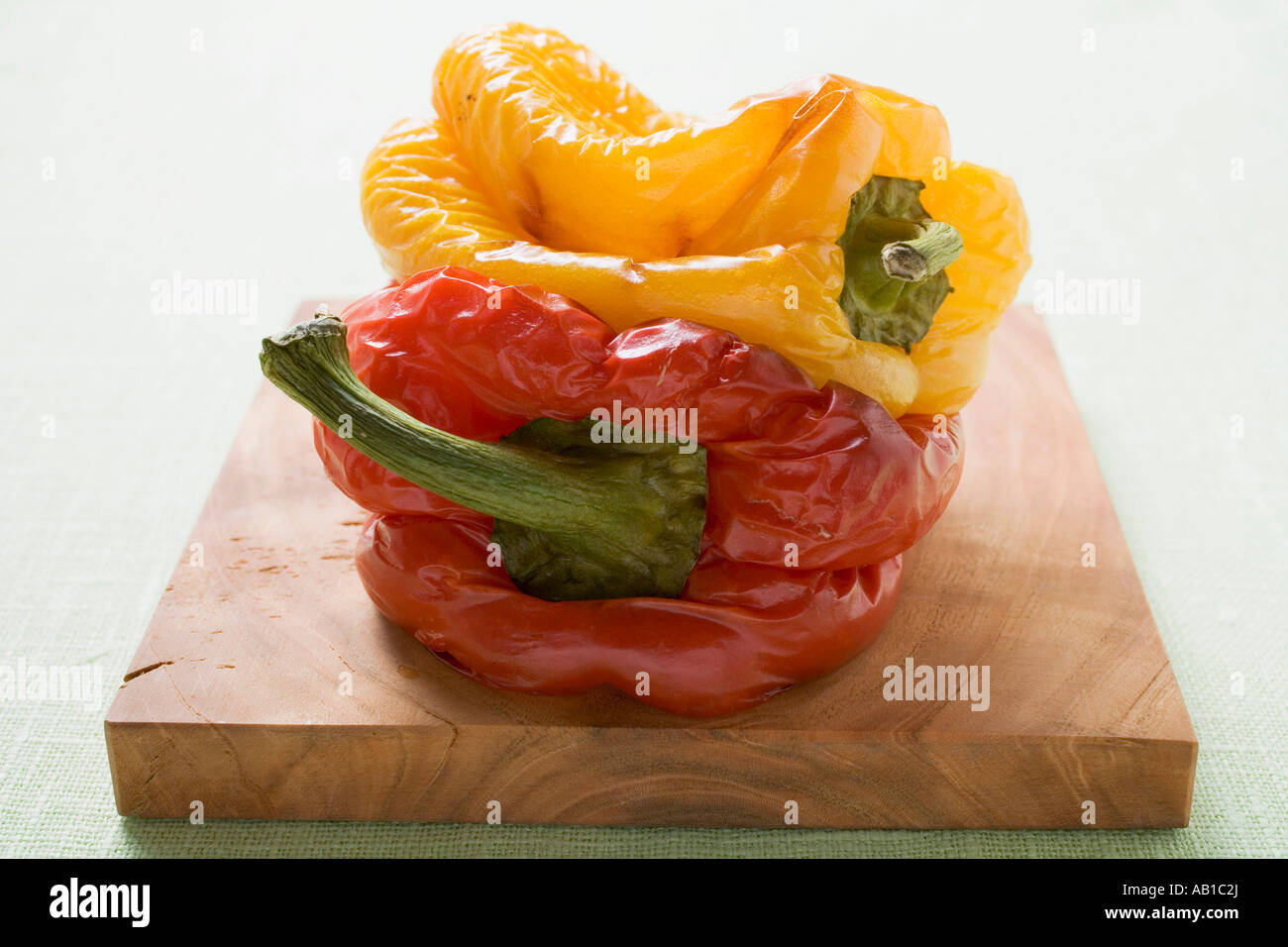 Grilled peppers on chopping board FoodCollection Stock Photo - Alamy