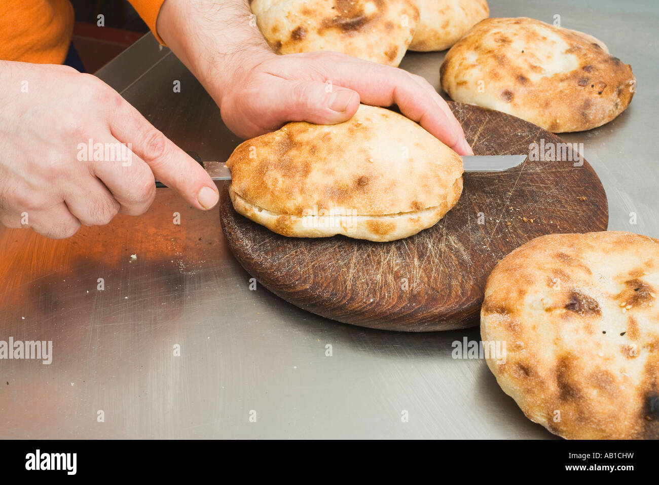Splitting pita bread FoodCollection Stock Photo Alamy