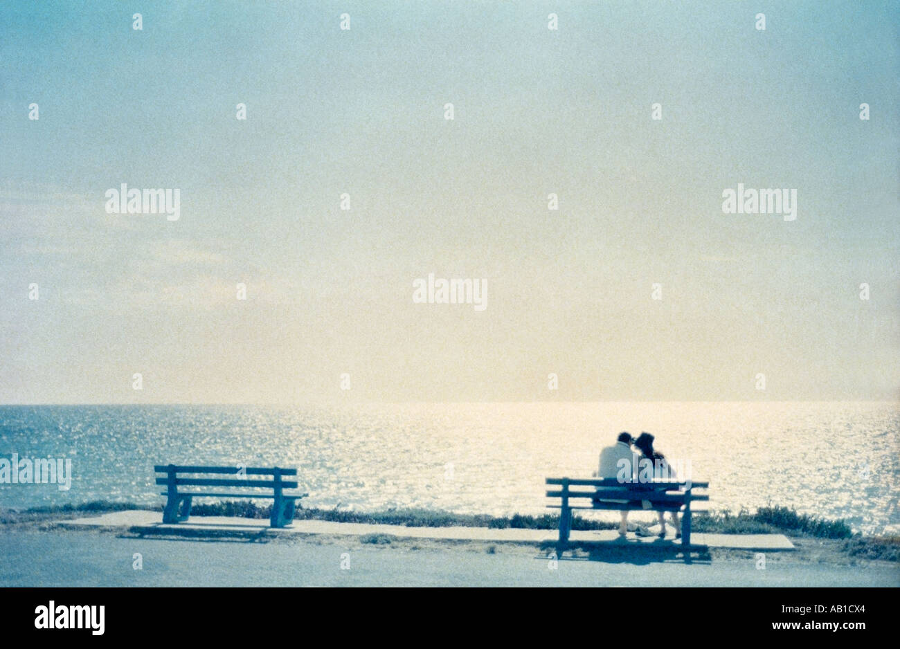 Backside man sitting on bench hi-res stock photography and images - Alamy