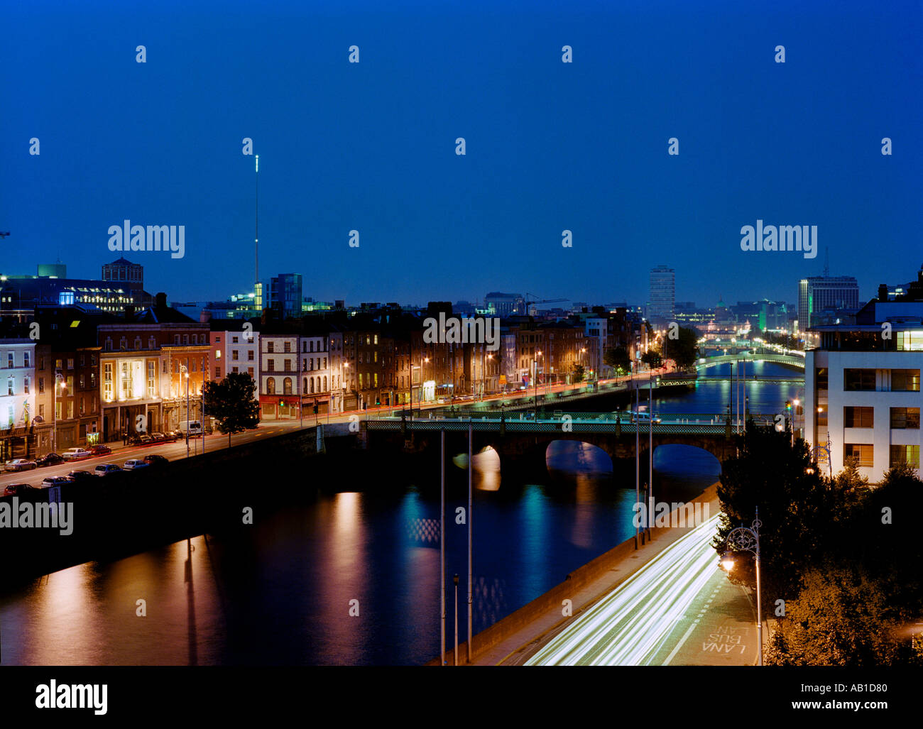 An evening scene of the river Liffey in Dublin, Ireland, including the Spire of Dublin Stock