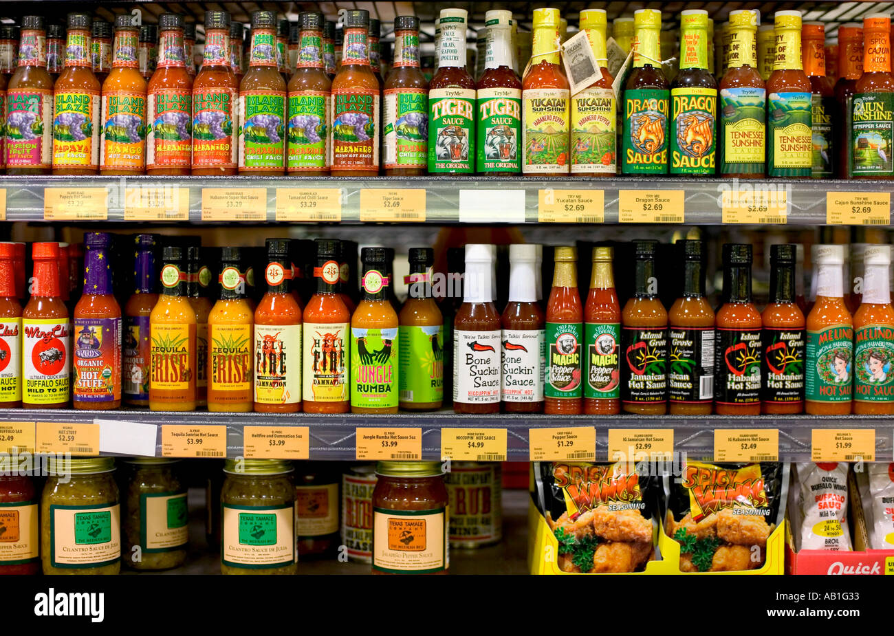 Bottled condiments at market Stock Photo Alamy