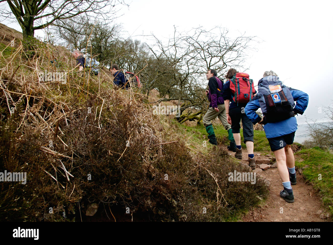 Woman Walking Up Steep Hill High Resolution Stock Photography and