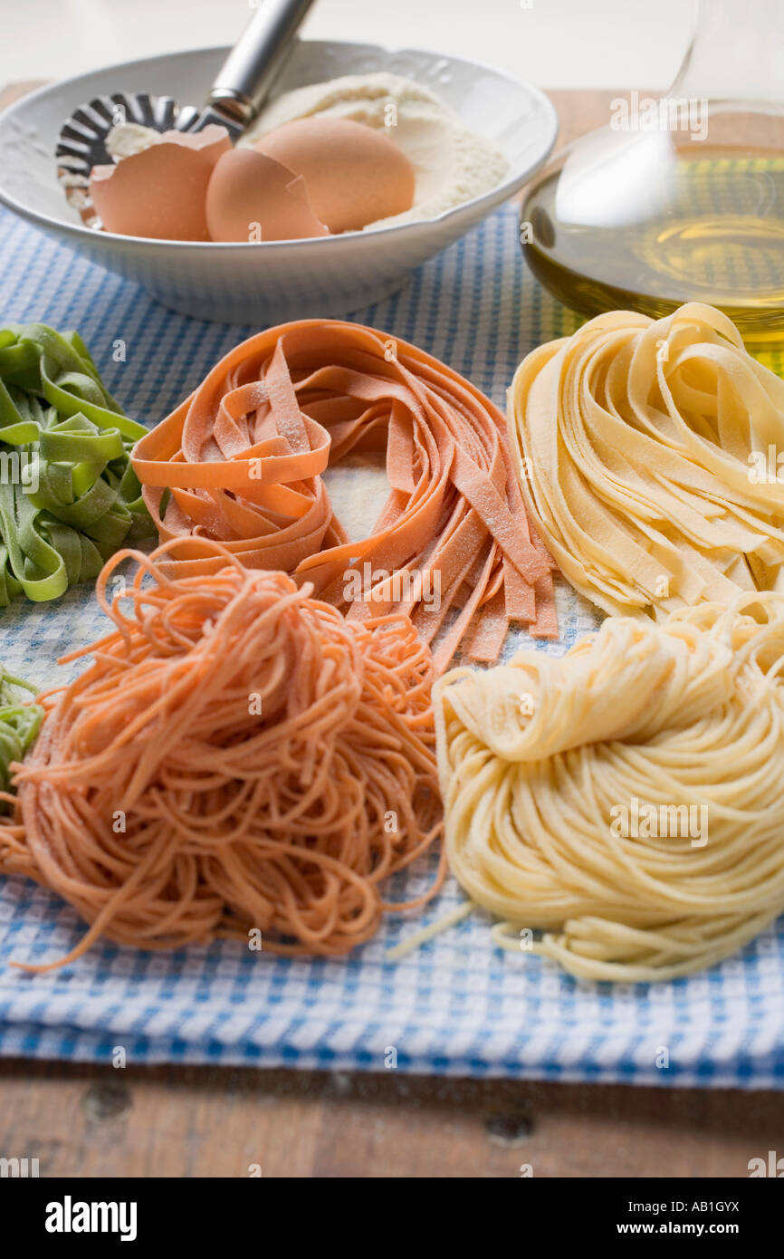 Various types of home made pasta with ingredients FoodCollection Stock Photo