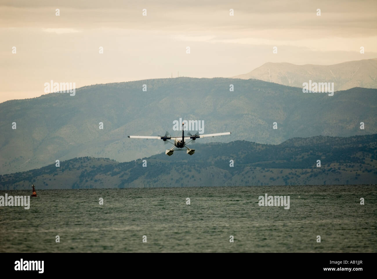 Twin Otter seaplane taking off Stock Photo - Alamy