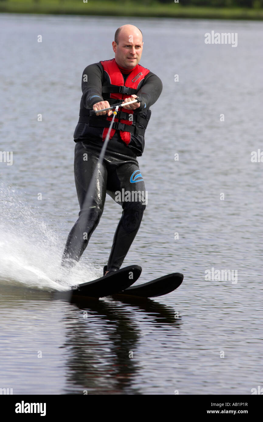 Male waterskiing in wetsuit hi-res stock photography and images - Alamy