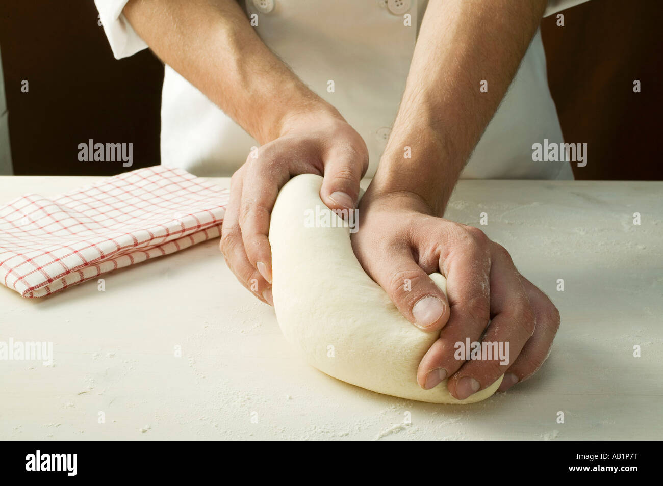 Kneading pizza dough FoodCollection Stock Photo - Alamy